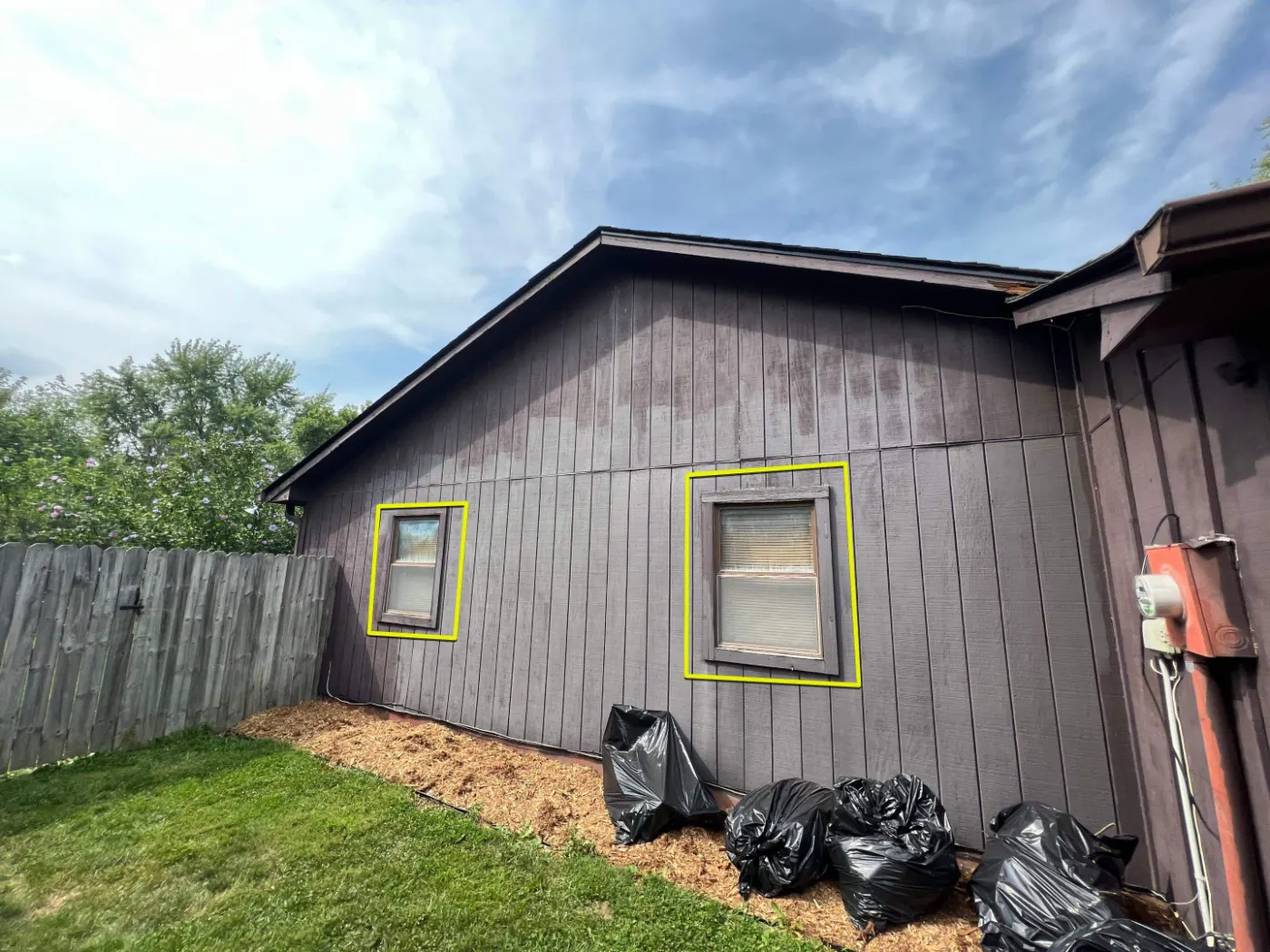 Storm-damaged window documented in Sandstone